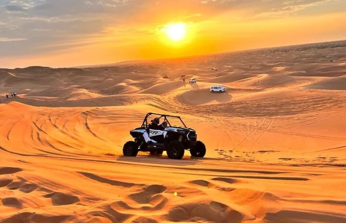 Morning Desert Safari Dubai – golden dunes at sunrise with 4x4 dune bashing
